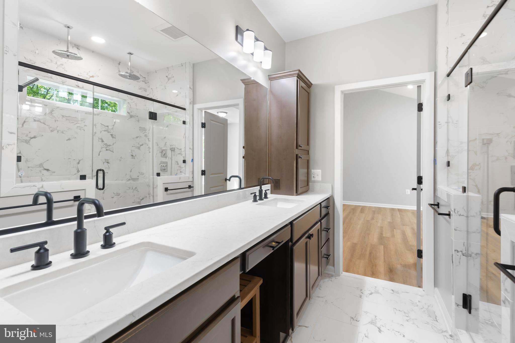 1 Riley Road Warrenton, VA 20187 - Photo 15 of 24 a bathroom with a double vanity sink mirror and double