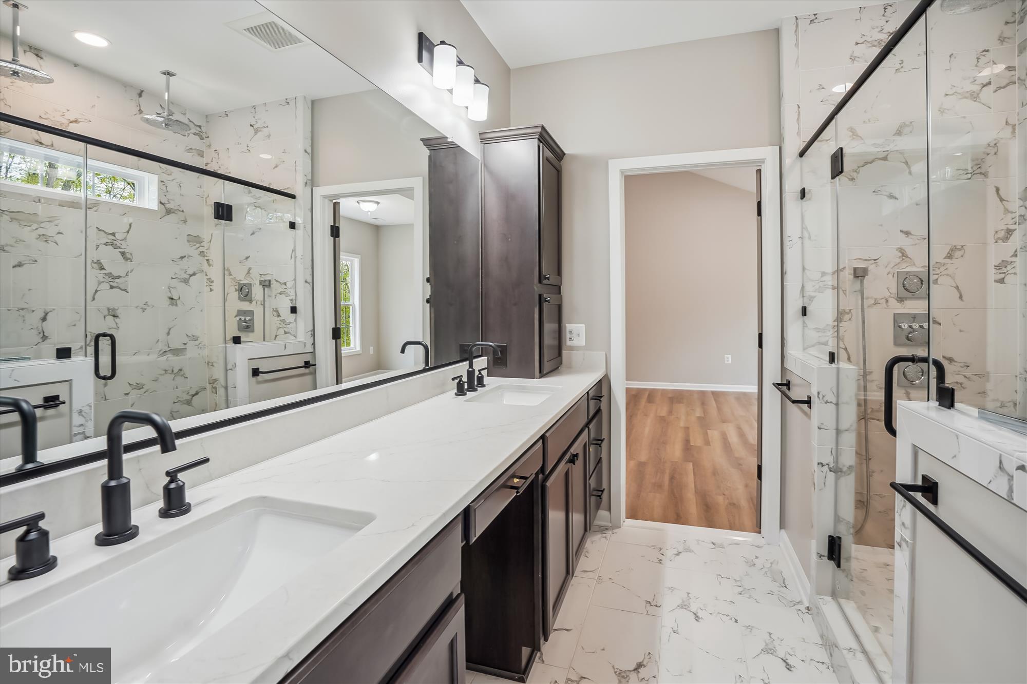 1 Riley Road Warrenton, VA 20187 - Photo 16 of 24 a bathroom with a double vanity sink mirror double and shower