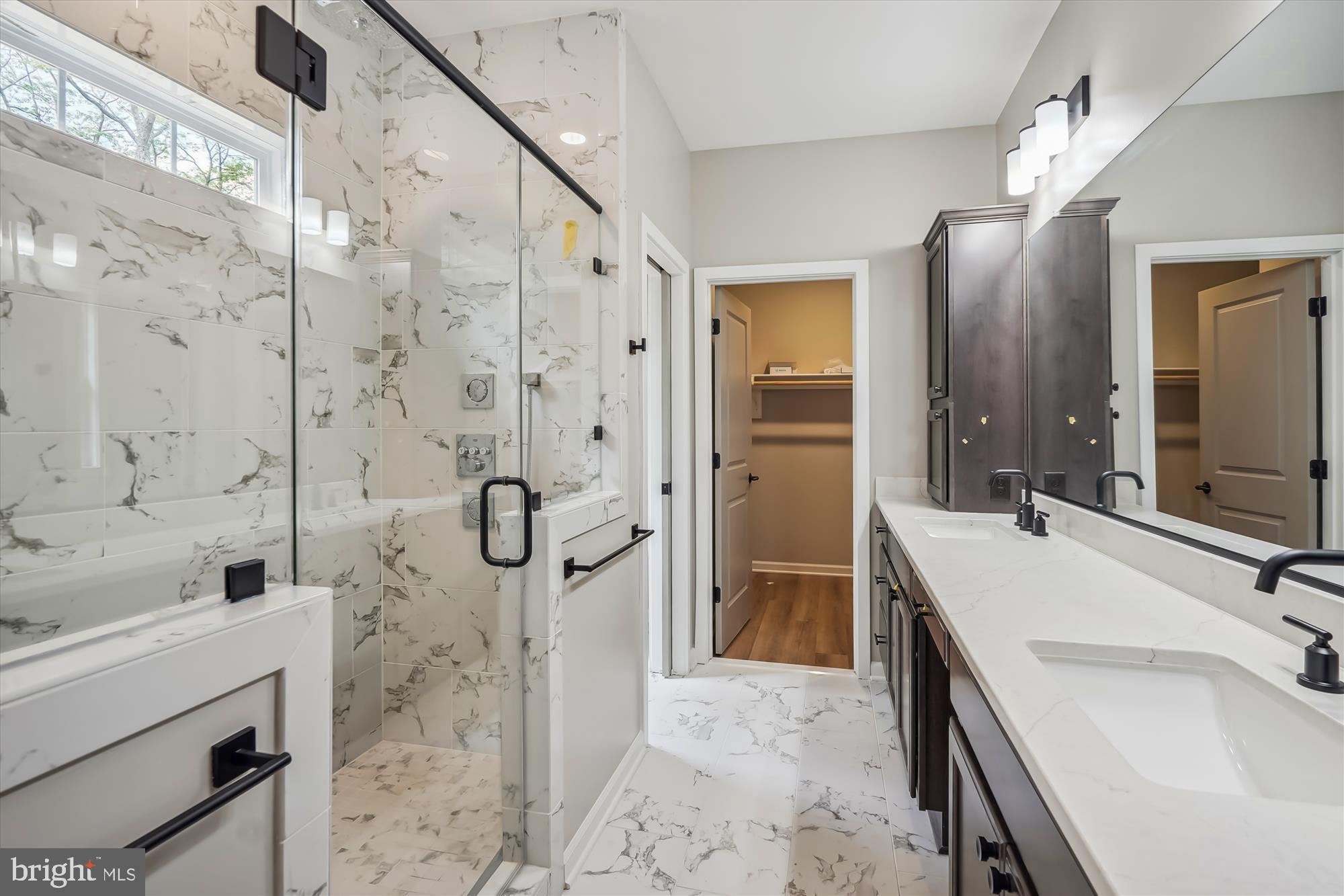 1 Riley Road Warrenton, VA 20187 - Photo 17 of 24 a bathroom with a tub sink shower and mirror