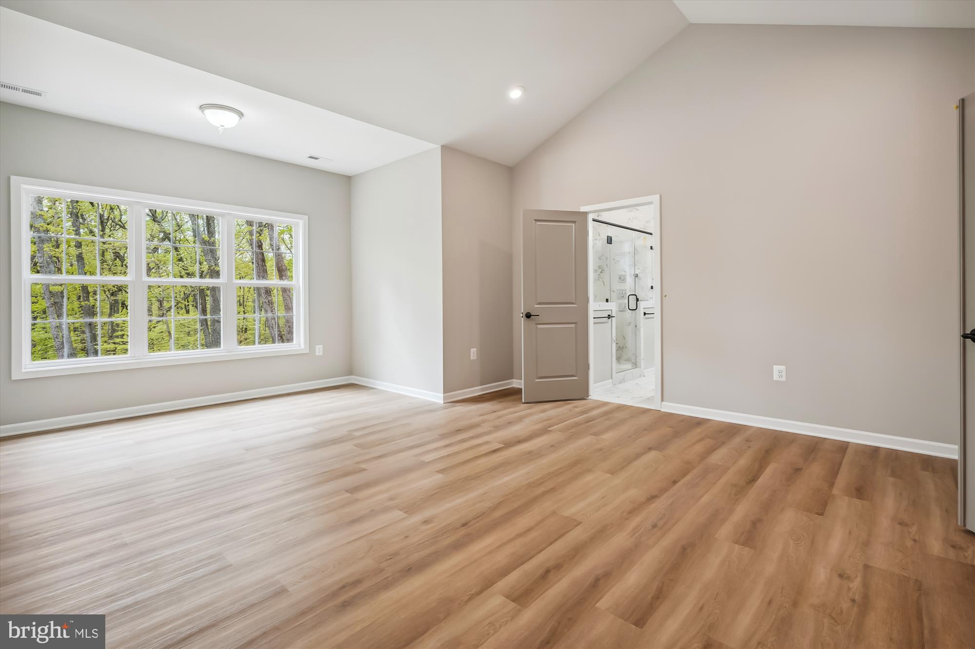 1 Riley Road Warrenton, VA 20187 - Photo 19 of 24 an empty room with wooden floor and windows