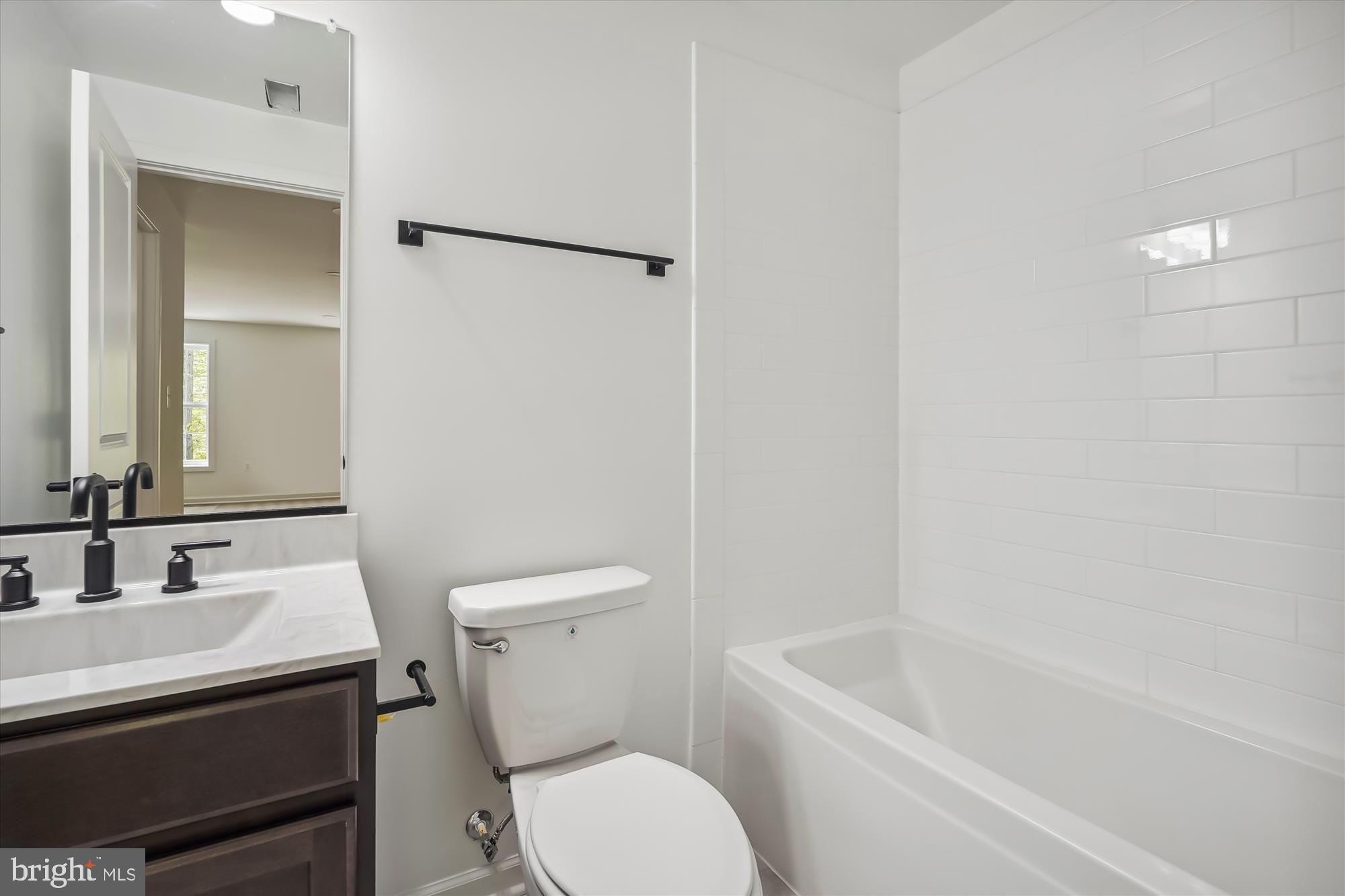 1 Riley Road Warrenton, VA 20187 - Photo 24 of 24 a bathroom with a sink a toilet and shower