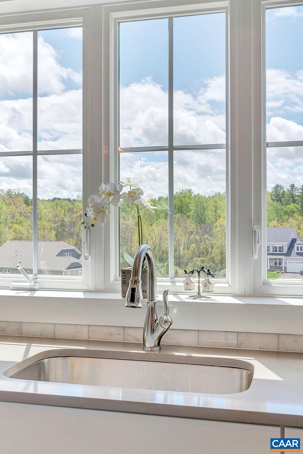 1445 Thompson Farm Road Charlottesville, VA 22901 - Photo 16 of 33 a view of a sink and a table