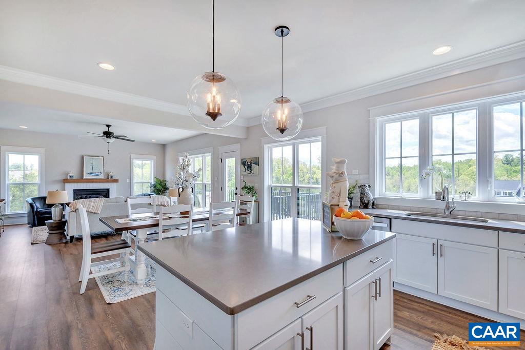 1445 Thompson Farm Road Charlottesville, VA 22901 - Photo 18 of 33 a open kitchen with sink a large window and dining table