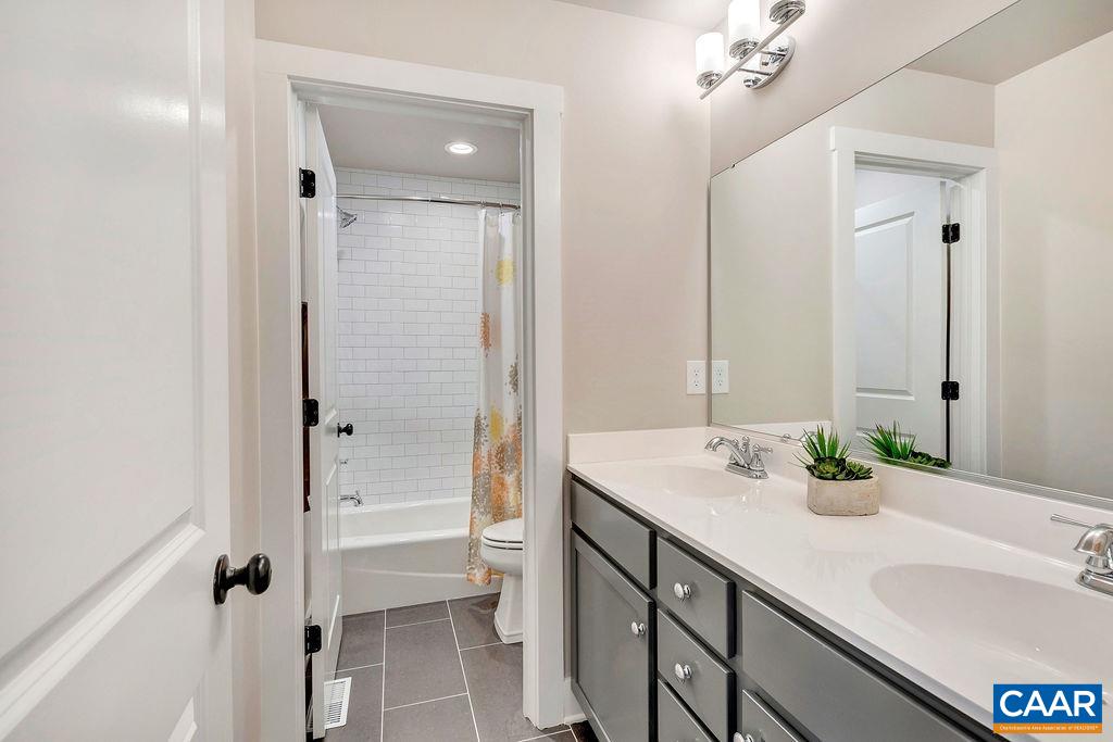 1445 Thompson Farm Road Charlottesville, VA 22901 - Photo 25 of 33 a bathroom with a sink and a mirror
