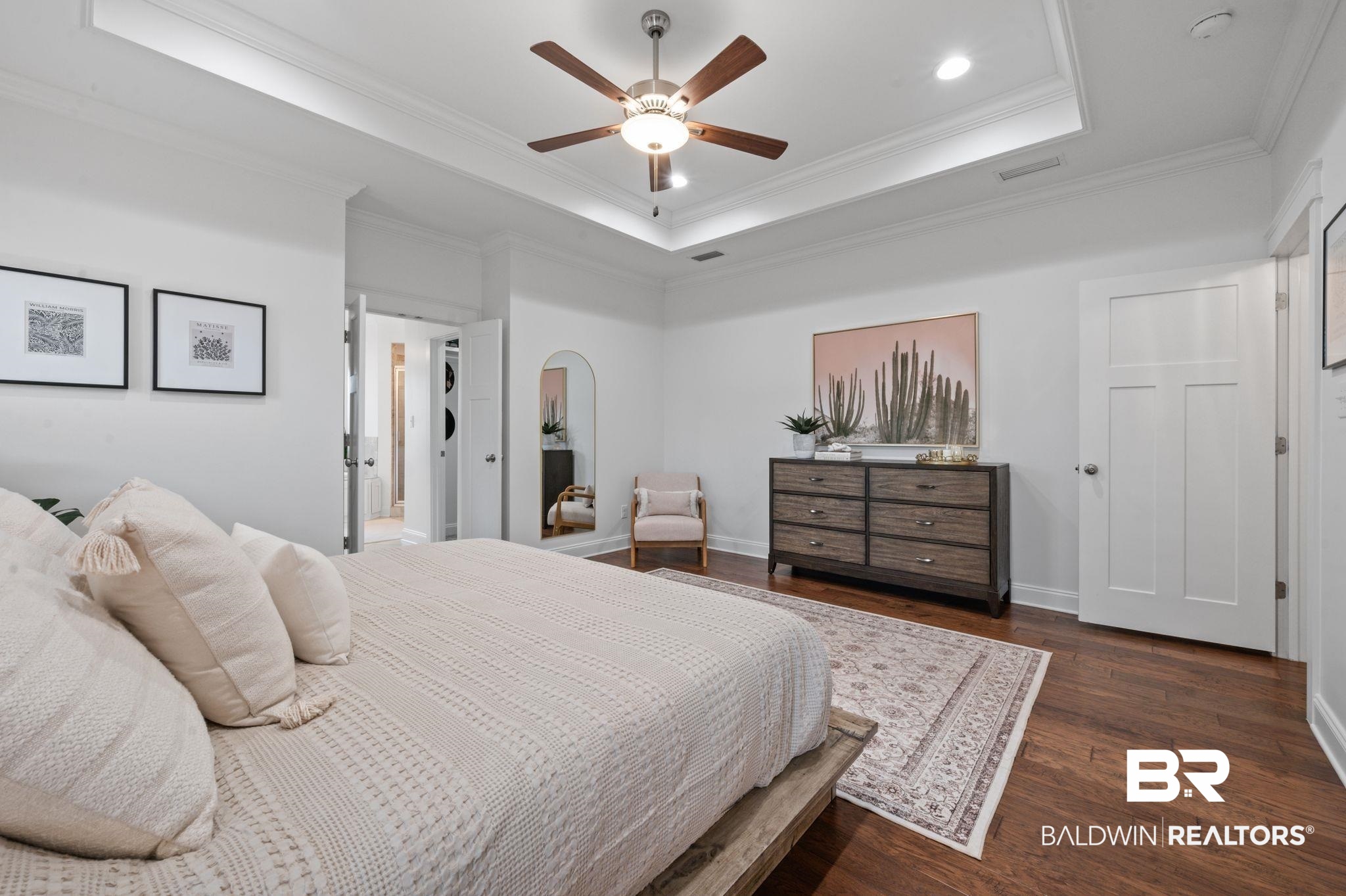 418 Fortune Drive Fairhope, AL 36532 - Photo 24 of 63 Bedroom with ceiling fan, dark wood-type flooring, a tray ceiling, and ornamental molding