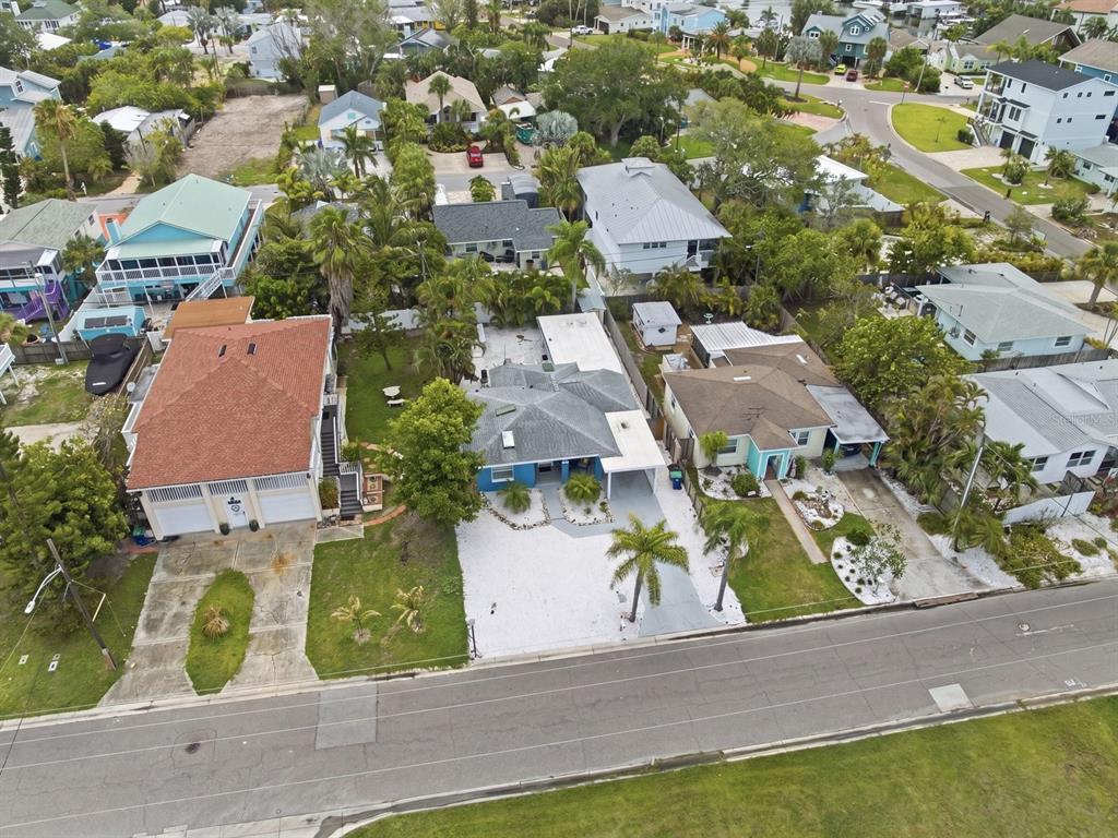 1207 1st Street Indian Rocks Beach, FL 33785 - Photo 43 of 60 an aerial view of residential houses with yard