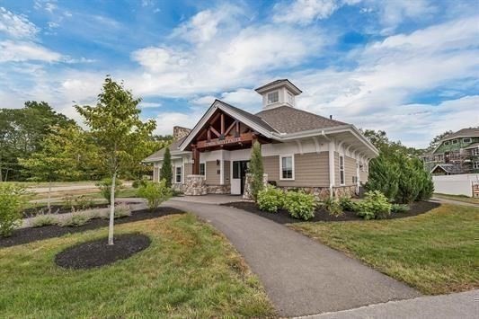 7 Longview Drive, Unit 105 Atkinson, NH 03811 - Photo 27 of 30 a front view of a house with a yard