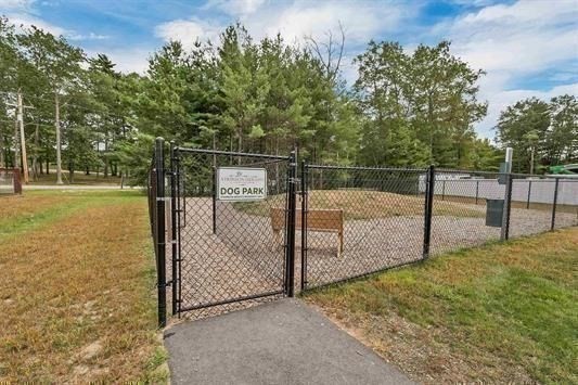7 Longview Drive, Unit 105 Atkinson, NH 03811 - Photo 28 of 30 a view of a backyard