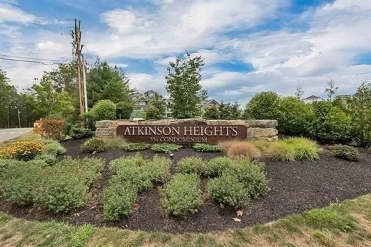 a view of a pathway in front of a house