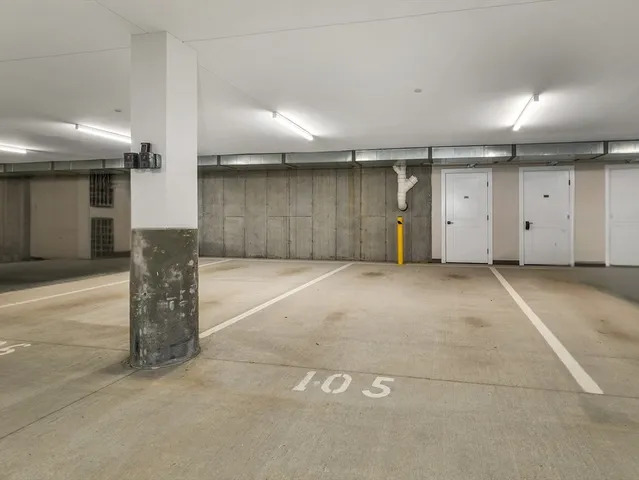 an empty room with wooden floor