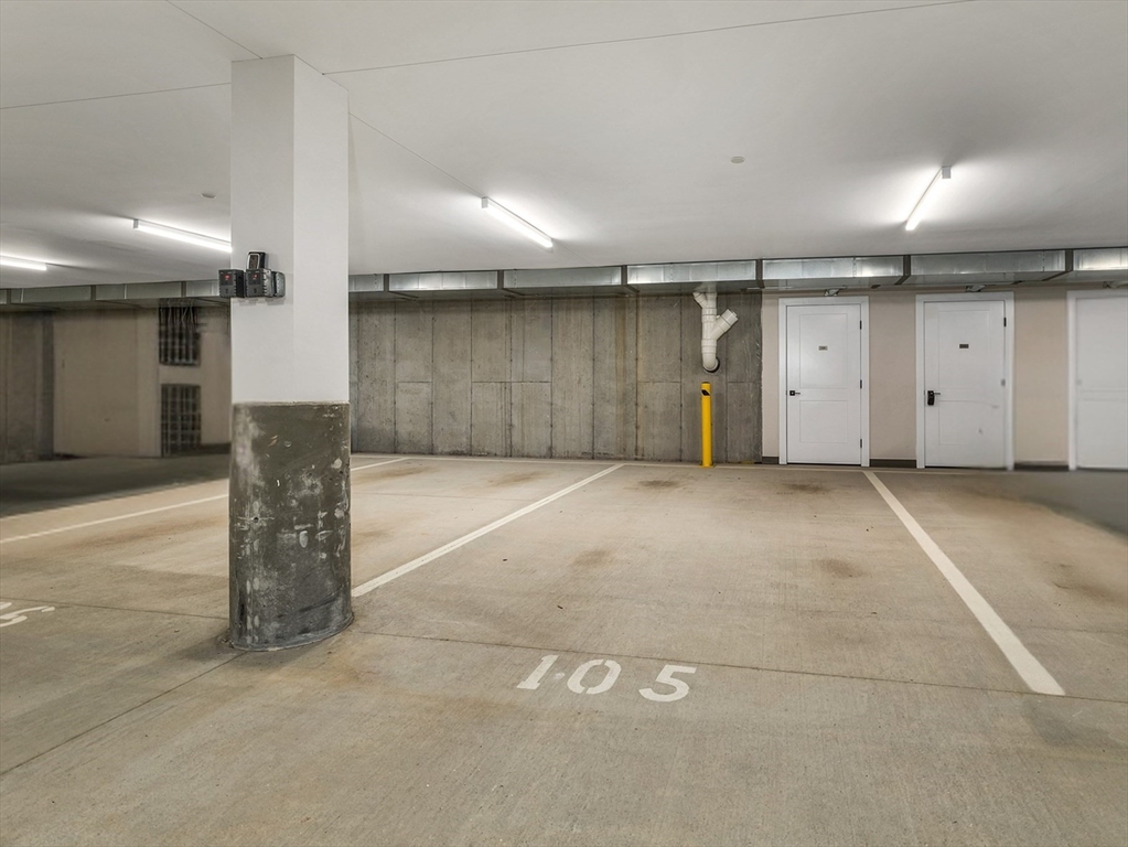 7 Longview Drive, Unit 105 Atkinson, NH 03811 - Photo 30 of 30 an empty room with wooden floor