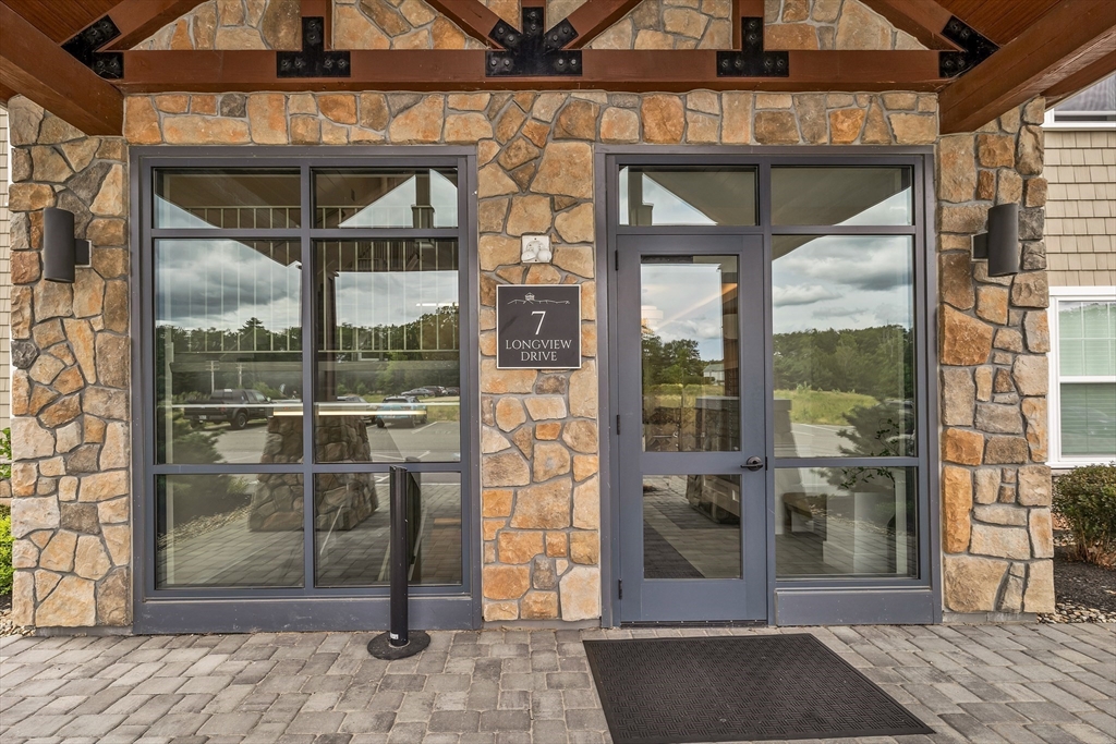 7 Longview Drive, Unit 105 Atkinson, NH 03811 - Photo 4 of 30 a glass building view