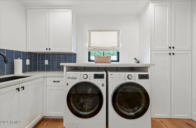 an aerial view of a golf course with a swimming pool