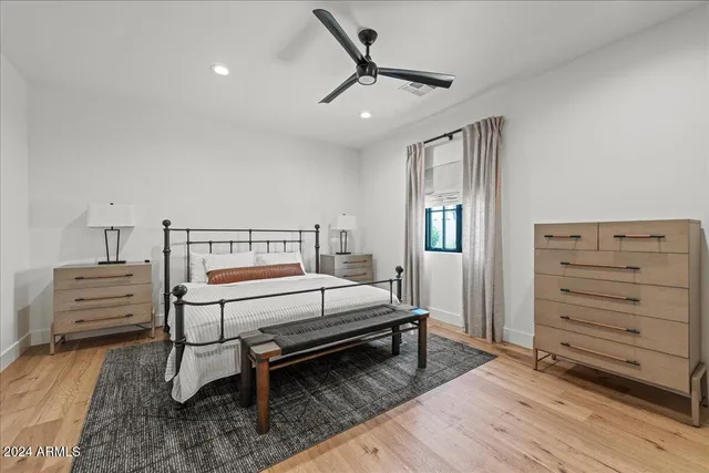 a bedroom with a bed and furniture