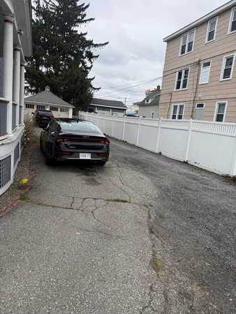 a car parked in front of a building