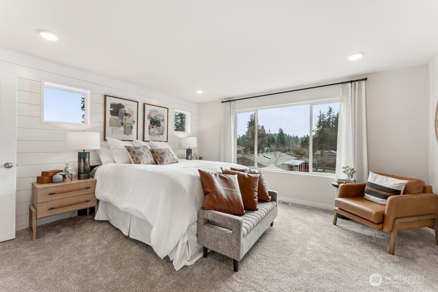 17529 Northeast Midnight Sun Loop Poulsbo, WA 98370 - Photo 27 of 36 a living room with furniture and a large window