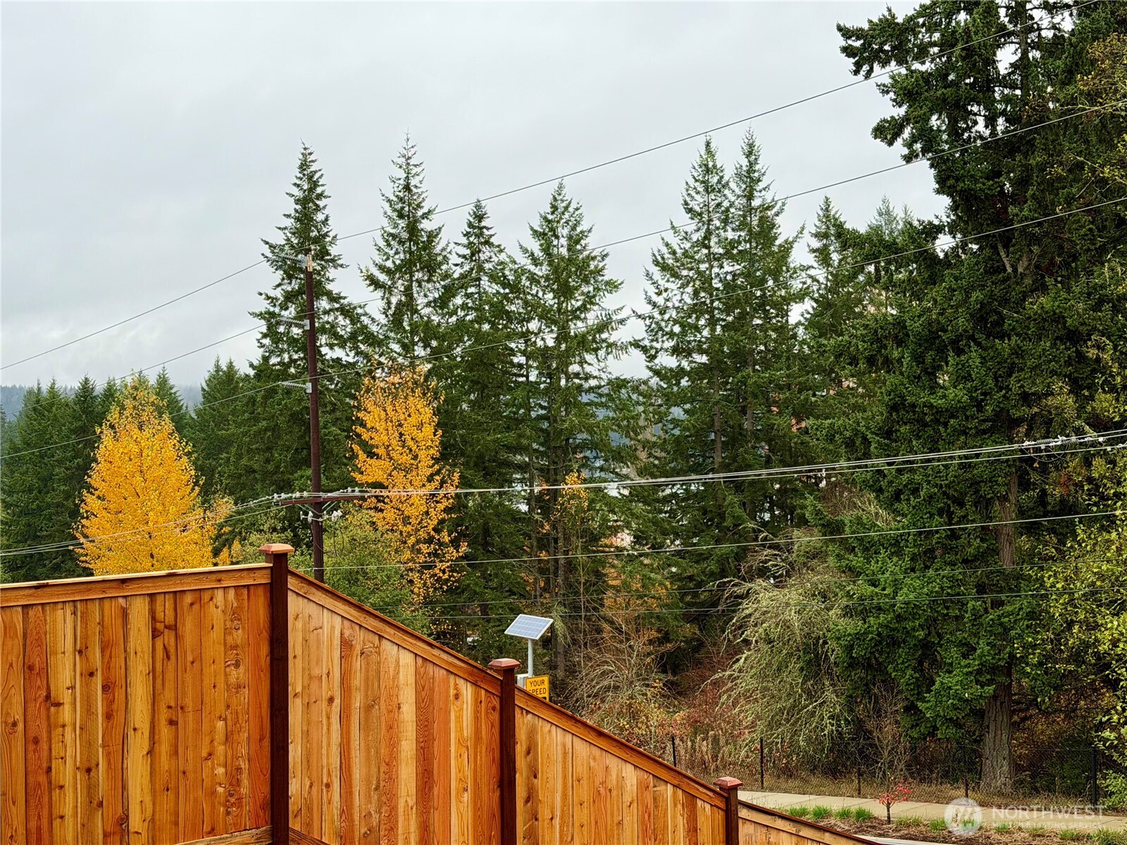17529 Northeast Midnight Sun Loop Poulsbo, WA 98370 - Photo 4 of 36 a view of a balcony with an outdoor space