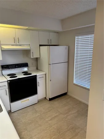 a utility room with a washer and dryer