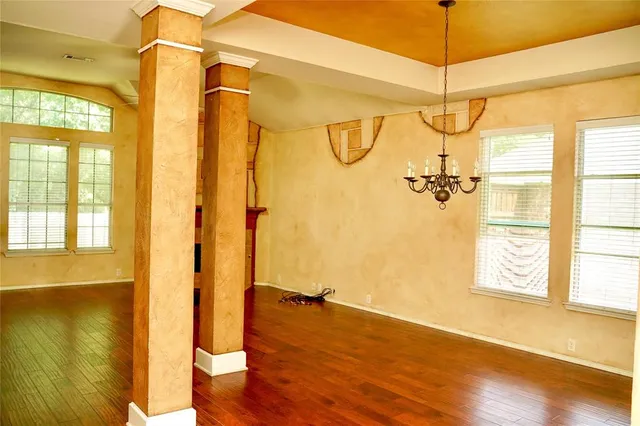 a view of a bathroom with a window and a shower