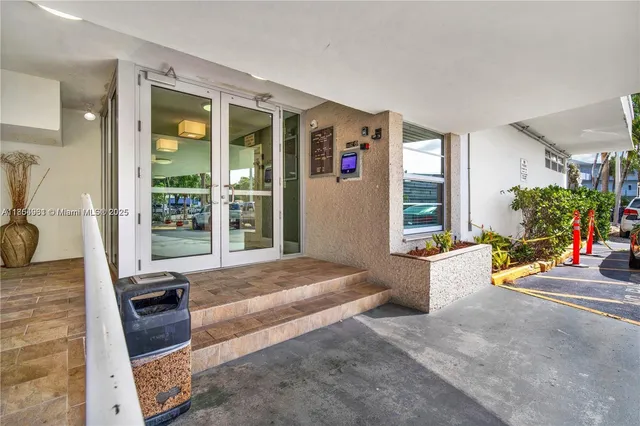 a spacious bedroom with a bed and a window