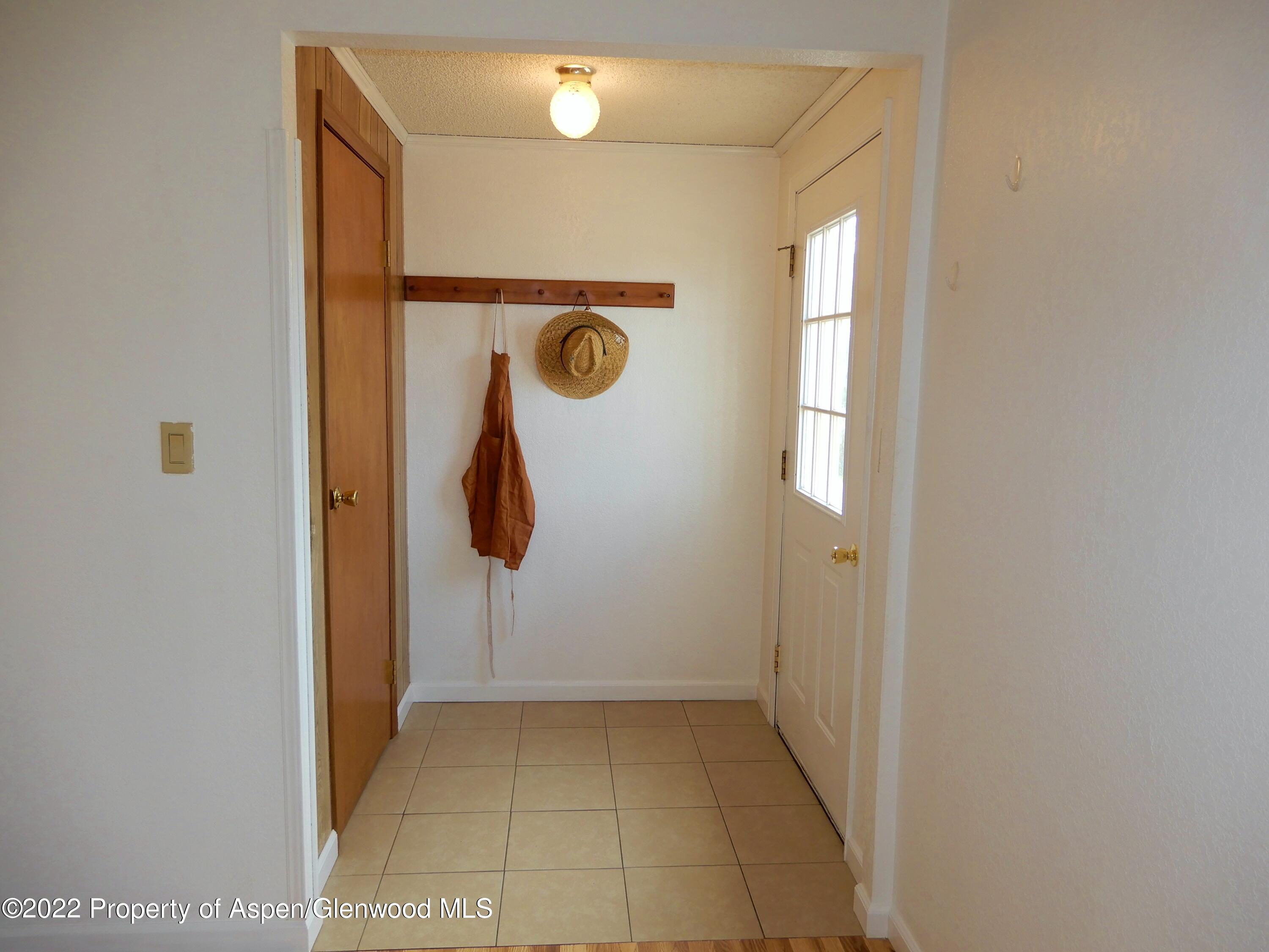 1110 Arnold Court Rifle, CO 81650 - Photo 3 of 23 a view of a storage & utility room with a window