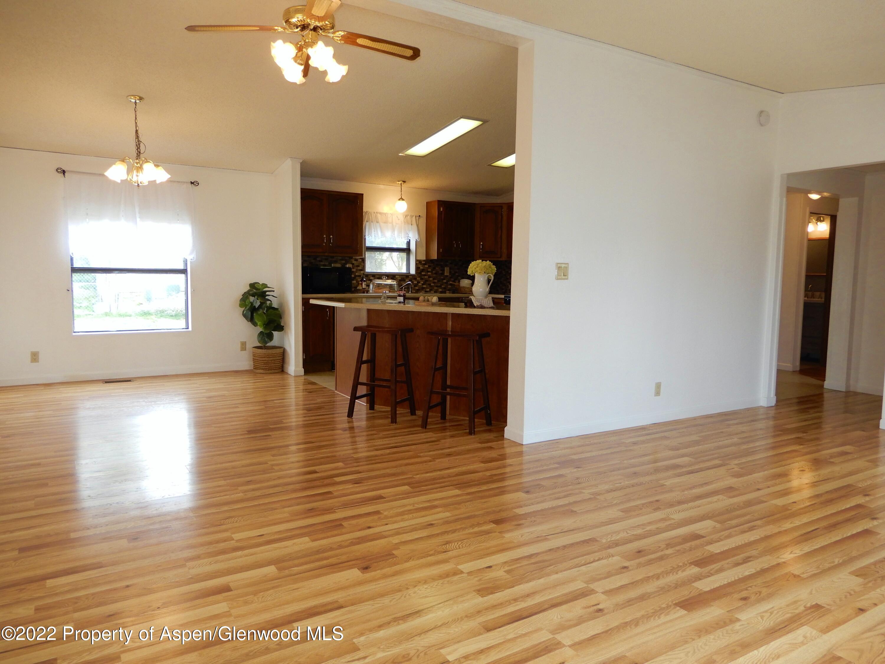 1110 Arnold Court Rifle, CO 81650 - Photo 6 of 23 a view of a livingroom with a kitchen