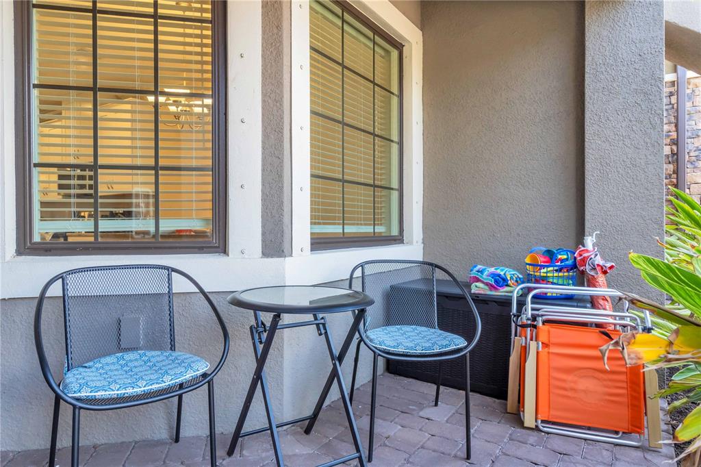 12413 Osorio Court, Unit 101 Sarasota, FL 34238 - Photo 35 of 46 a dining room with furniture and window