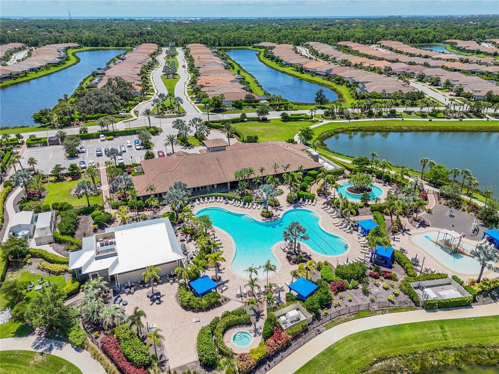 12413 Osorio Court, Unit 101 Sarasota, FL 34238 - Photo 41 of 46 an aerial view of residential house with outdoor space and lake view