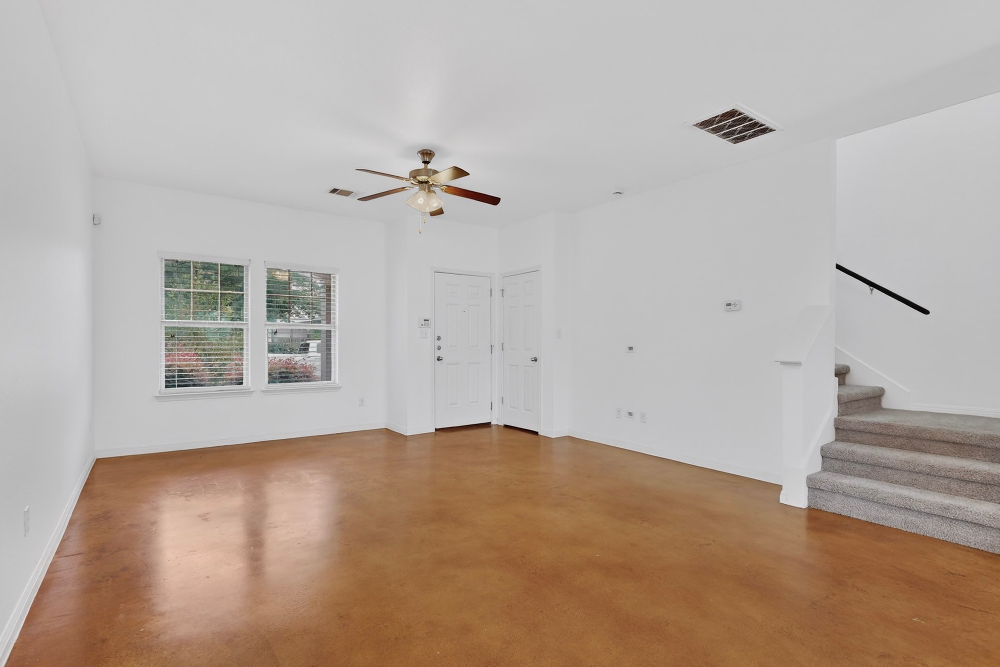 4619 Inicio Lane Austin, TX 78725 - Photo 4 of 32 a view of an empty room with a window