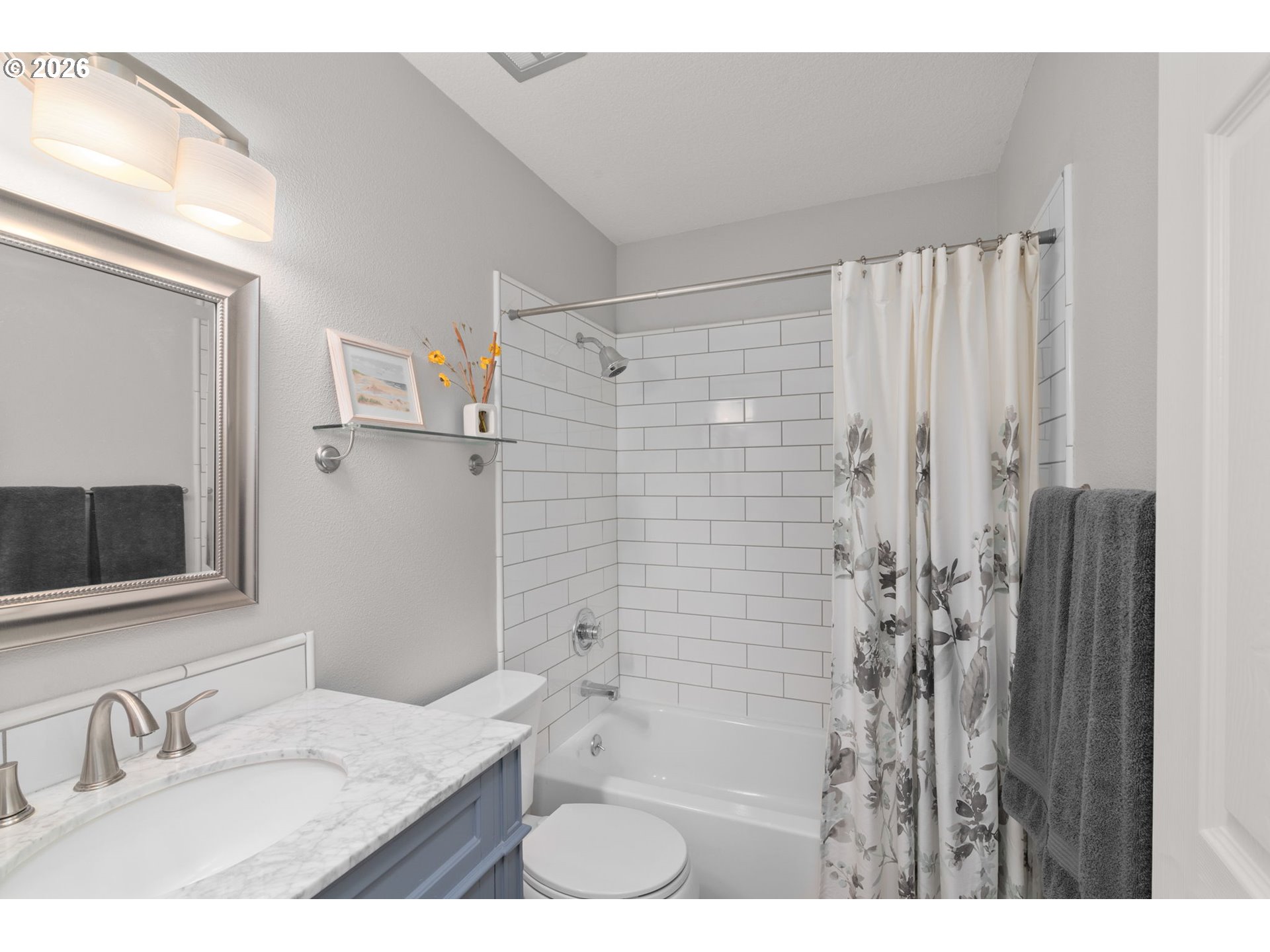 1200 Northeast Territorial Road, Unit 12 Canby, OR 97013 - Photo 23 of 38 a bathroom with a granite countertop sink toilet and shower