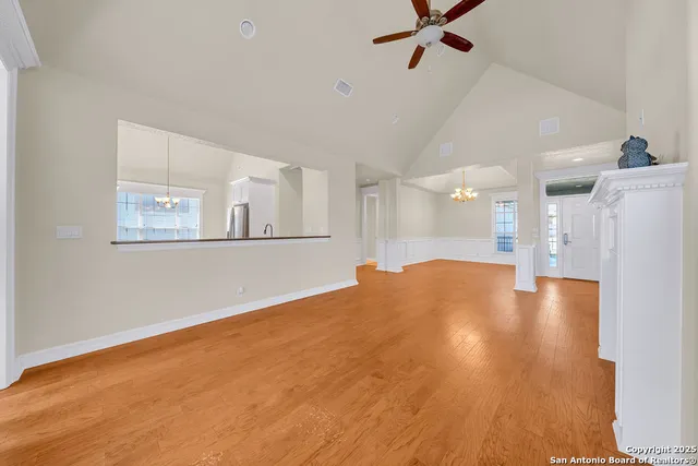 a view of a kitchen with a dishwasher and a refrigerator