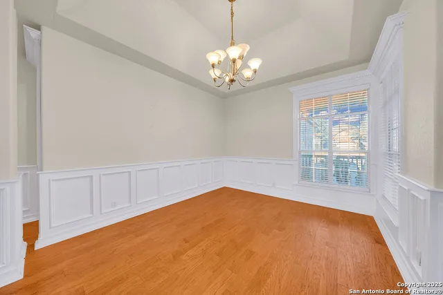 a view of a room with a large window