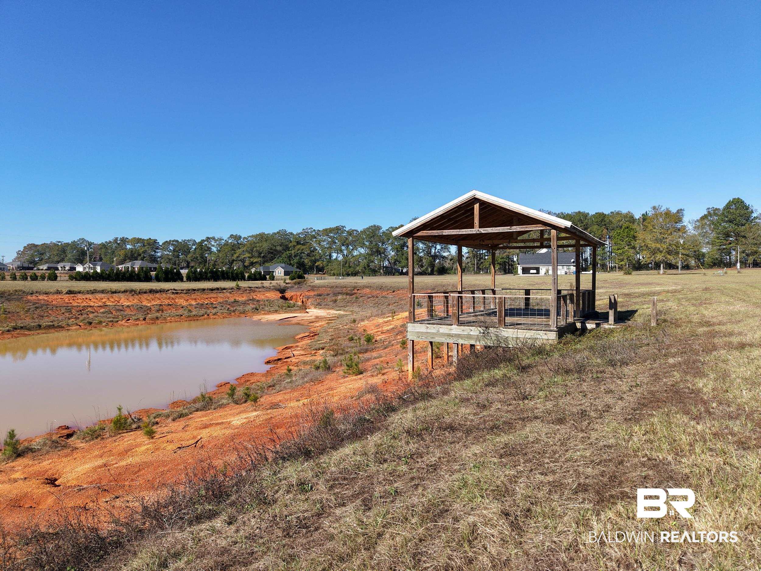 0 Stokley Court Atmore, AL 36502 - Photo 14 of 22 Dock area featuring a view of countryside and a water view