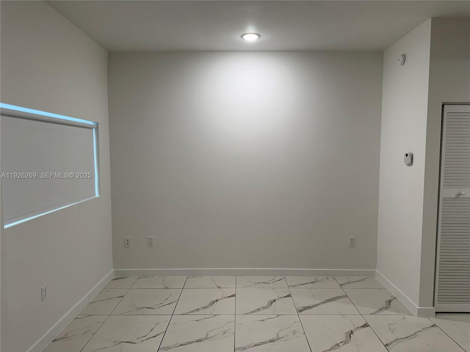 420 Southwest 7th Avenue, Unit 101 Miami, FL 33130 - Photo 9 of 16 a view of an empty room