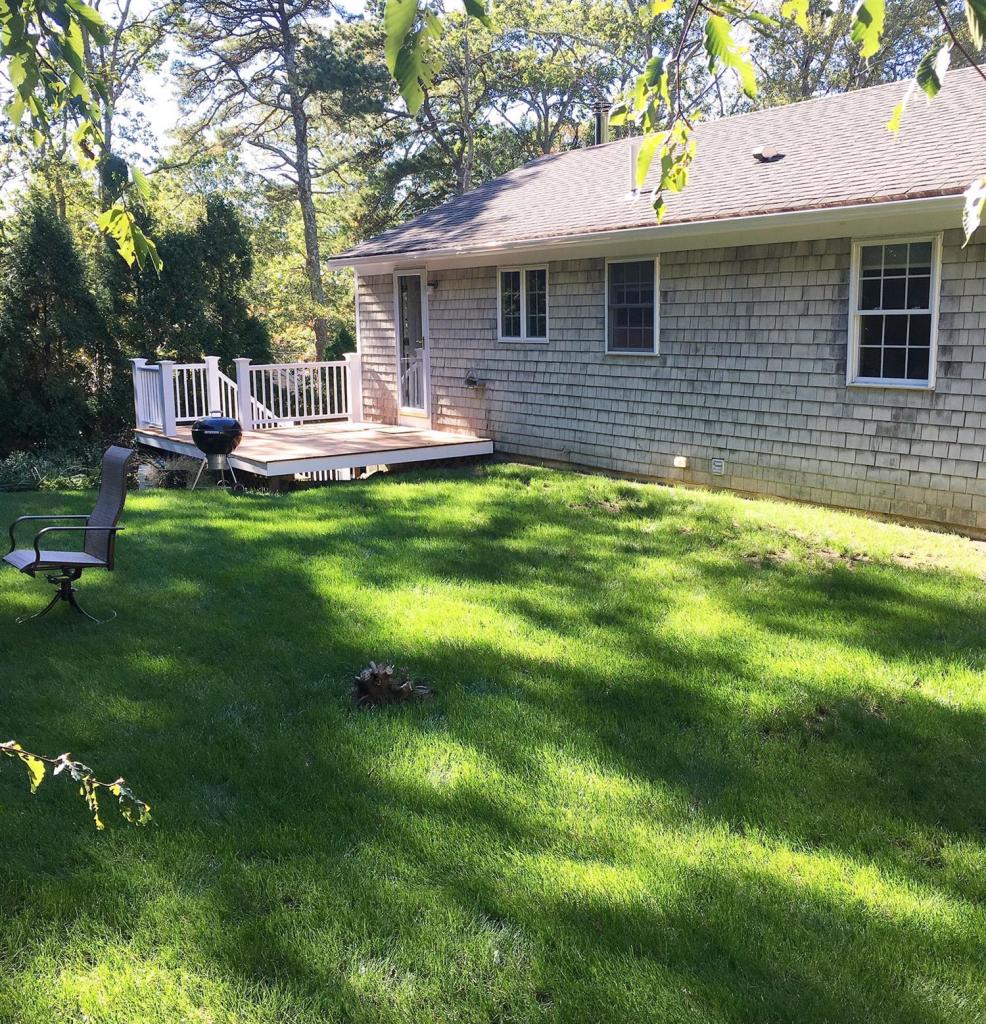 29 Snake Pond Road Forestdale, MA 02644 - Photo 14 of 18 a front view of a house with a yard