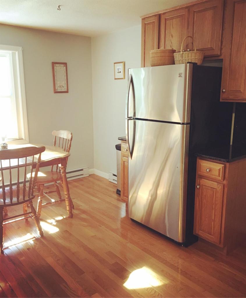 29 Snake Pond Road Forestdale, MA 02644 - Photo 4 of 18 a view of a refrigerator in kitchen and wooden floor