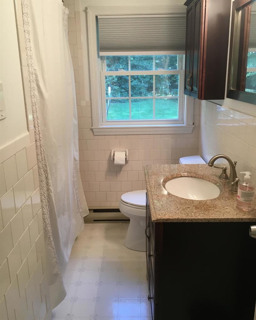29 Snake Pond Road Forestdale, MA 02644 - Photo 9 of 18 a bathroom with a granite countertop sink toilet and shower