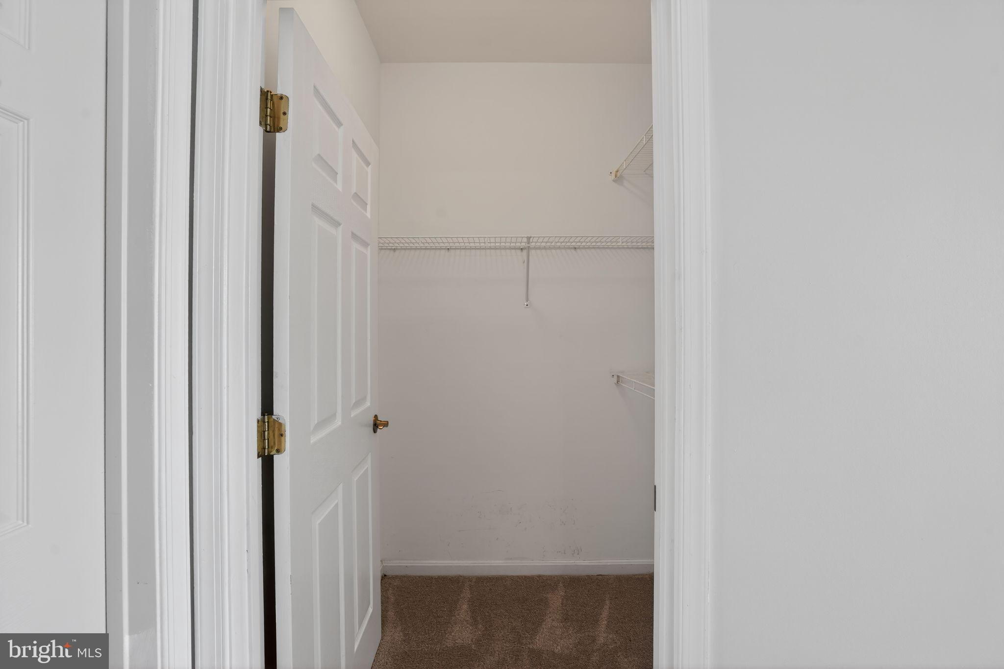 14040 New Acadia Lane, Unit 406 Kettering, MD 20774 - Photo 15 of 38 Primary Suite Closet