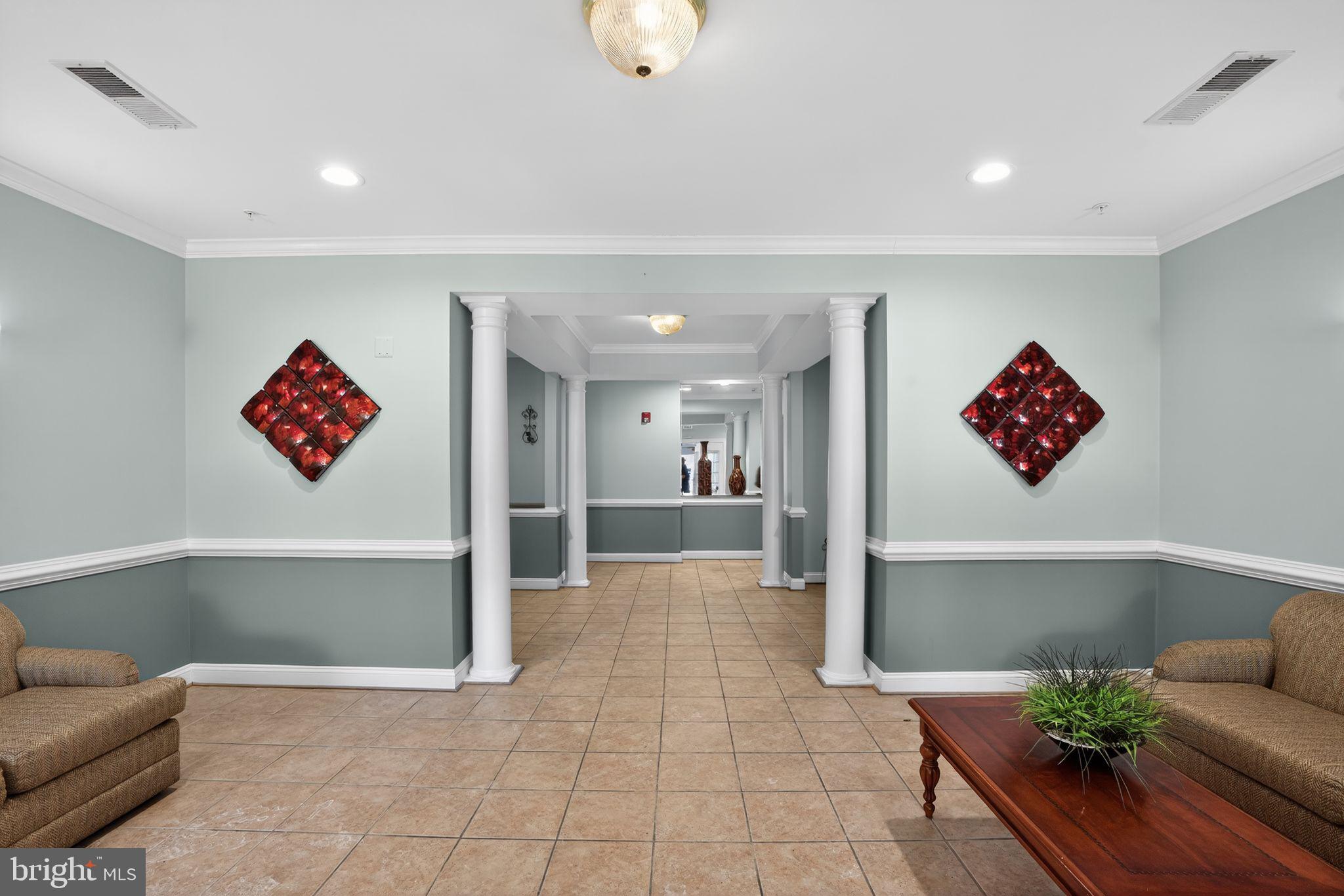 14040 New Acadia Lane, Unit 406 Kettering, MD 20774 - Photo 28 of 38 Building Foyer