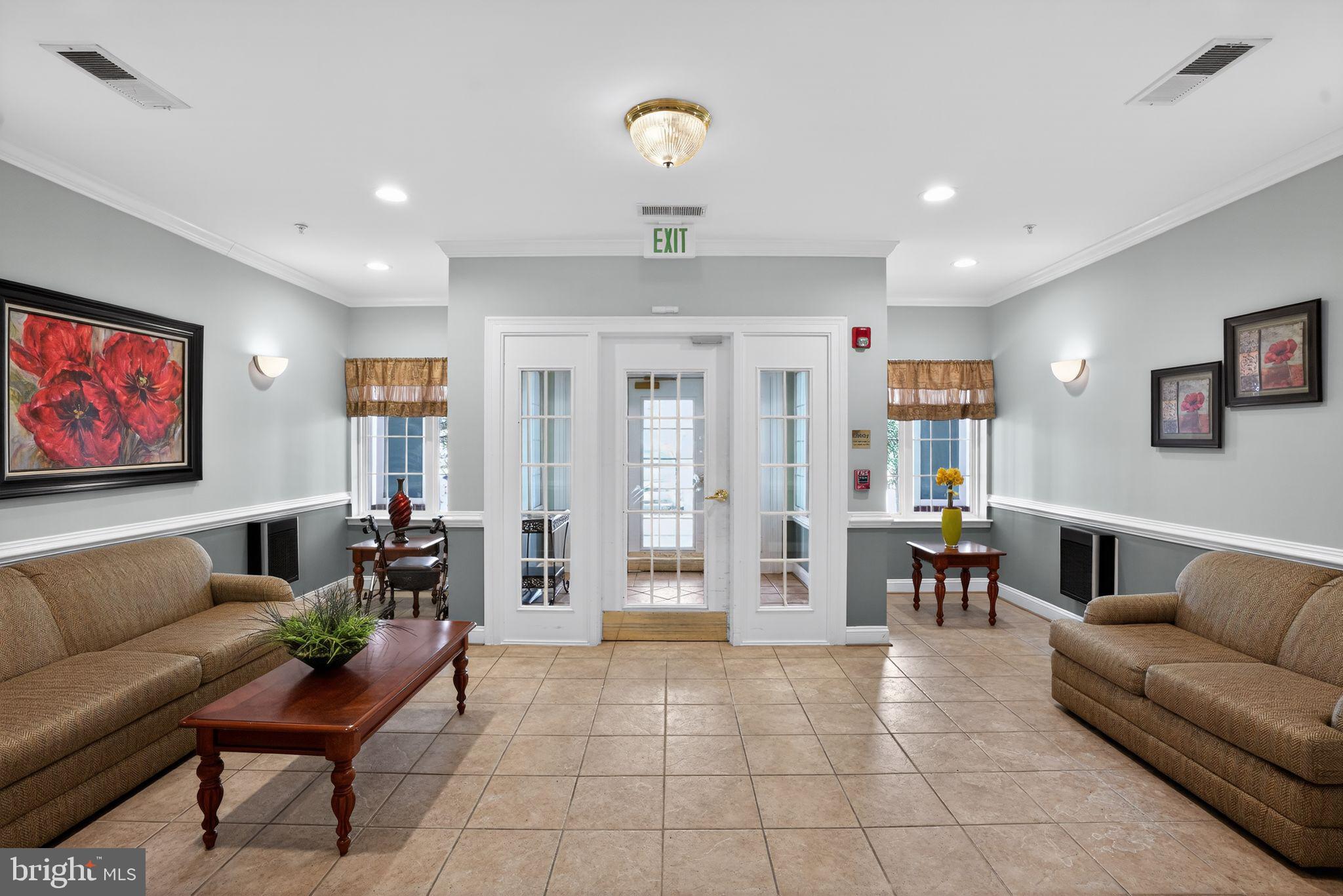 14040 New Acadia Lane, Unit 406 Kettering, MD 20774 - Photo 29 of 38 Building Foyer