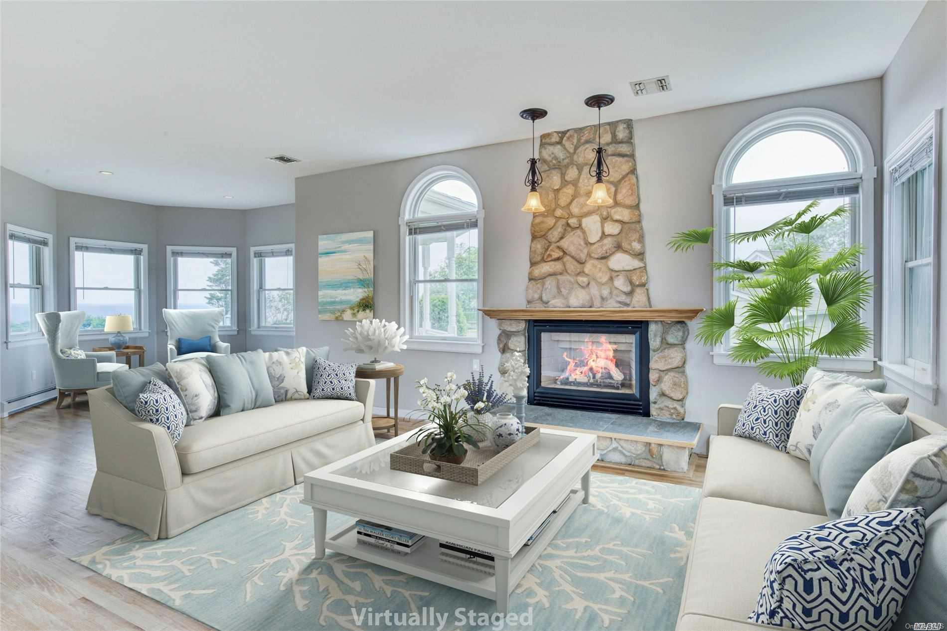1600 Sound View Road Orient, NY 11957 - Photo 1 of 1 a living room with furniture and a large window