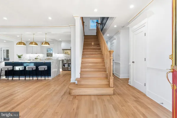 a view of dining room with furniture and wooden floor