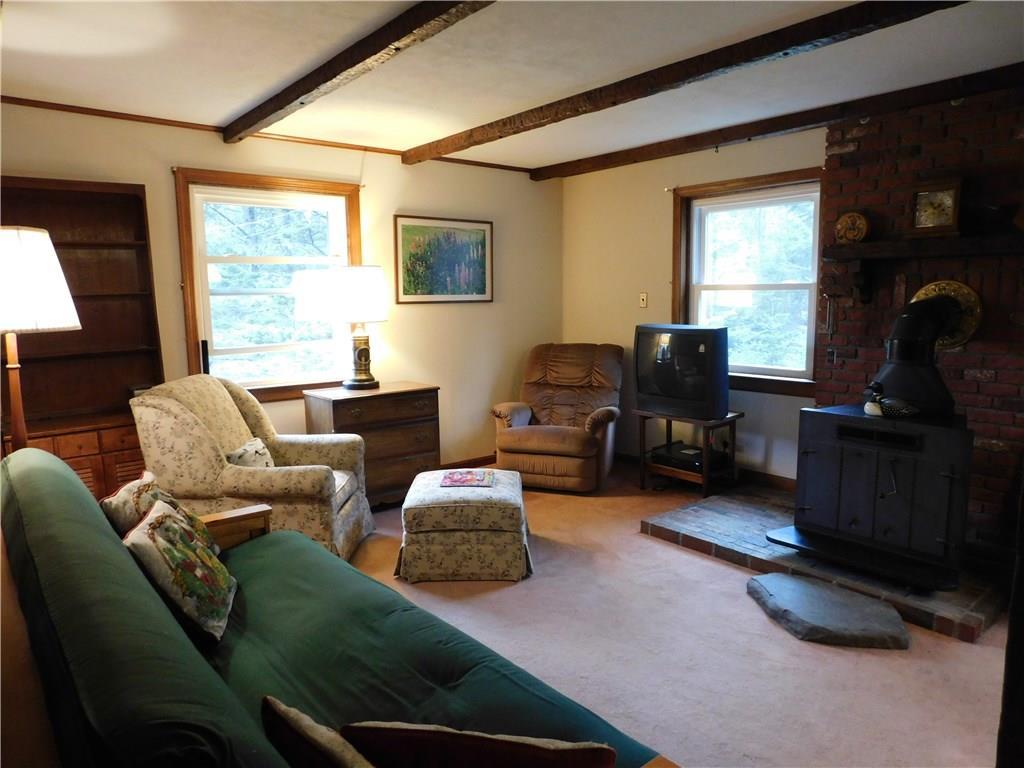 15 Cross Ridge Road Beaver Cove, ME 04441 - Photo 6 of 15 Stay warm by the woodstove in the...