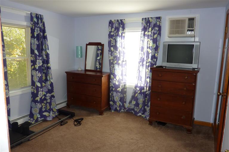 34 Wolley Road Hyannis, MA 02601 - Photo 12 of 19 a room with furniture and a flat tv screen