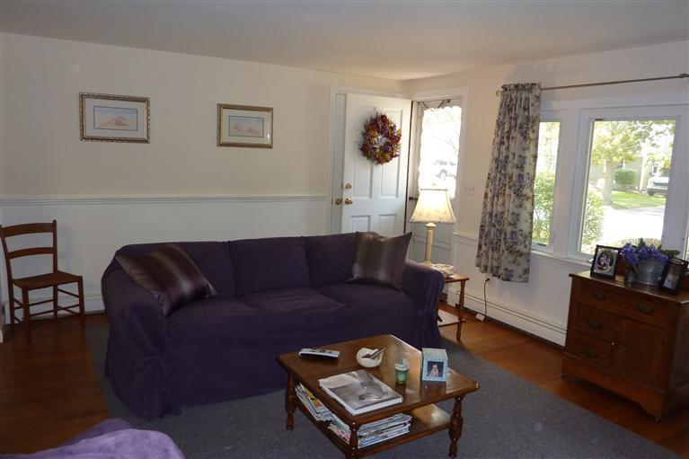 34 Wolley Road Hyannis, MA 02601 - Photo 14 of 19 a living room with furniture and a large window
