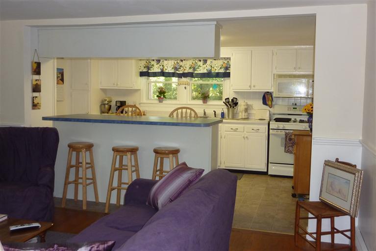 34 Wolley Road Hyannis, MA 02601 - Photo 6 of 19 a kitchen with a sink cabinets and window