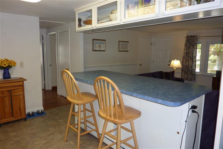 34 Wolley Road Hyannis, MA 02601 - Photo 9 of 19 a view of a dining room with furniture and window