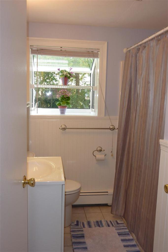 34 Wolley Road Hyannis, MA 02601 - Photo 10 of 19 a bathroom with a sink and a toilet