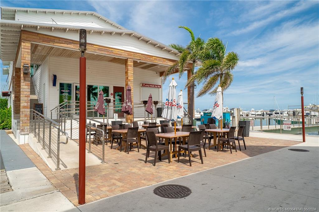 0 Jacobs Road Fort Pierce, FL 34982 - Photo 21 of 23 a view of a patio with dining table and chairs