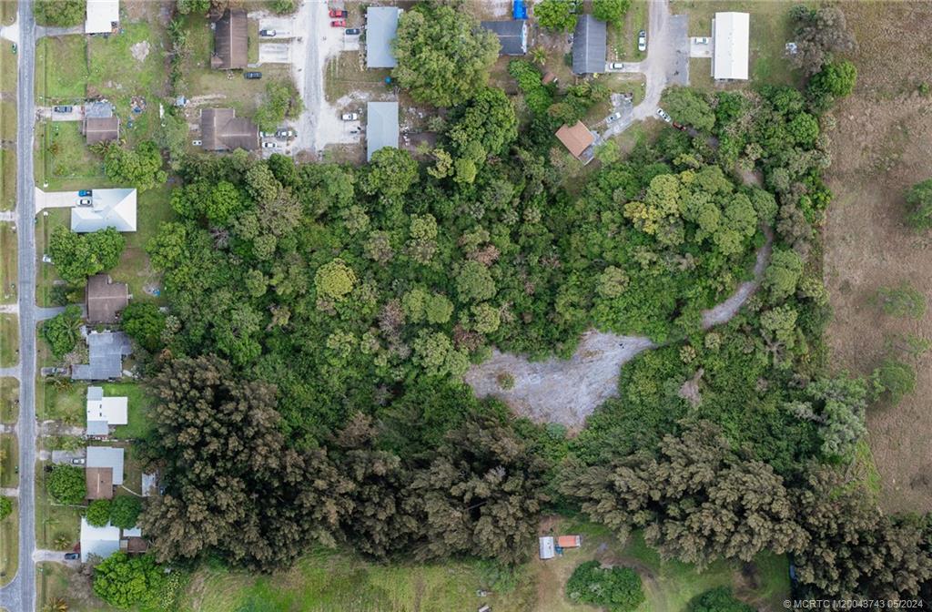 0 Jacobs Road Fort Pierce, FL 34982 - Photo 3 of 23 an aerial view of residential house with outdoor space and trees all around